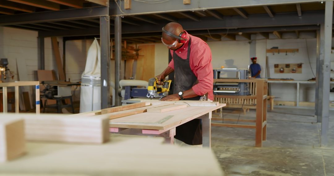 African American Craftsmen Working in a Carpentry Workshop