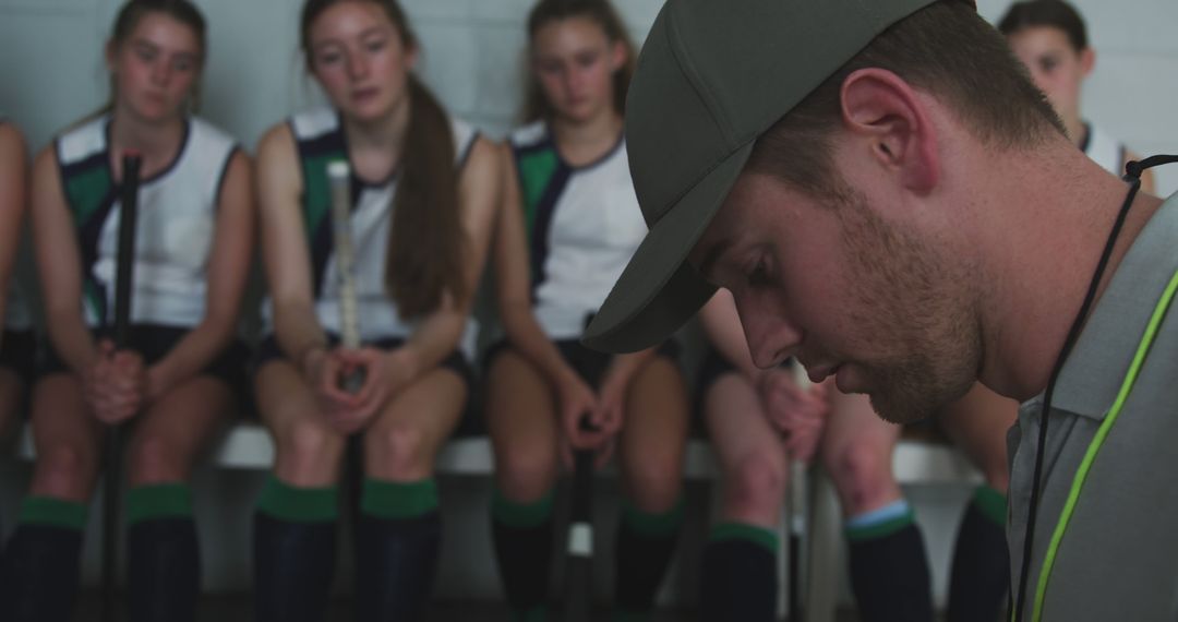 Field Hockey Coach Motivating Female Team Before Game - Free Images, Stock Photos and Pictures on Pikwizard.com