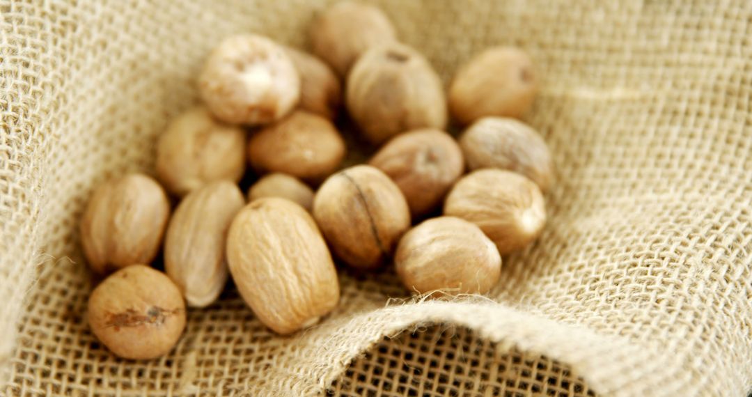 Close-up of nutmegs on sack 4k - Free Images, Stock Photos and Pictures on Pikwizard.com