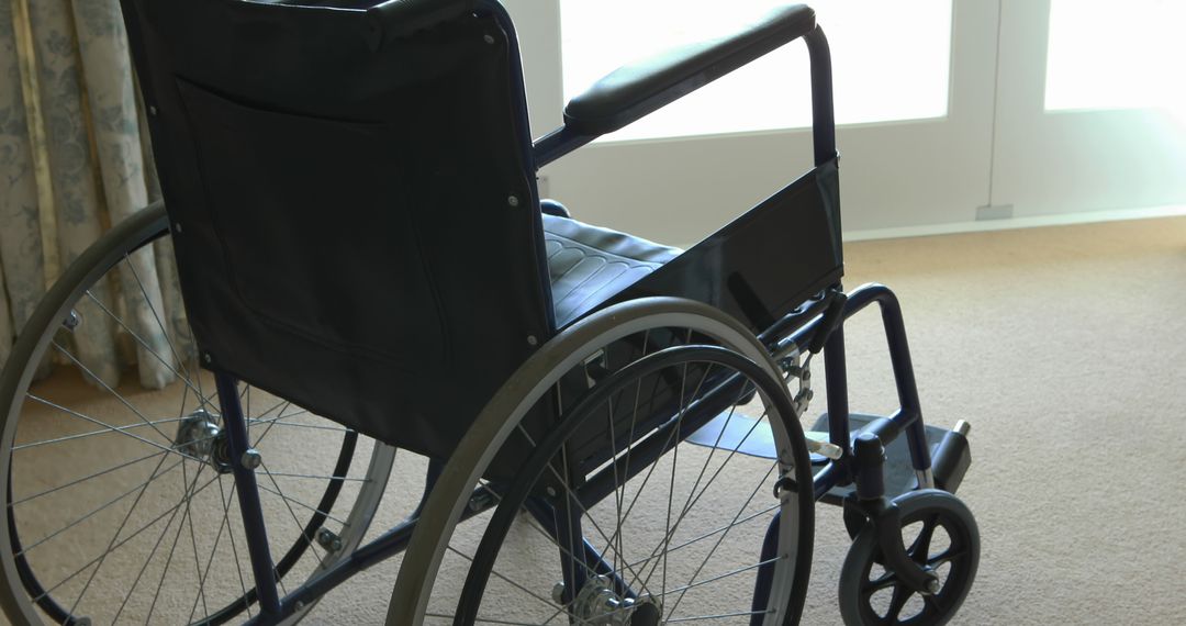 Empty Wheelchair in Sunlit Home Bedroom - Free Images, Stock Photos and Pictures on Pikwizard.com