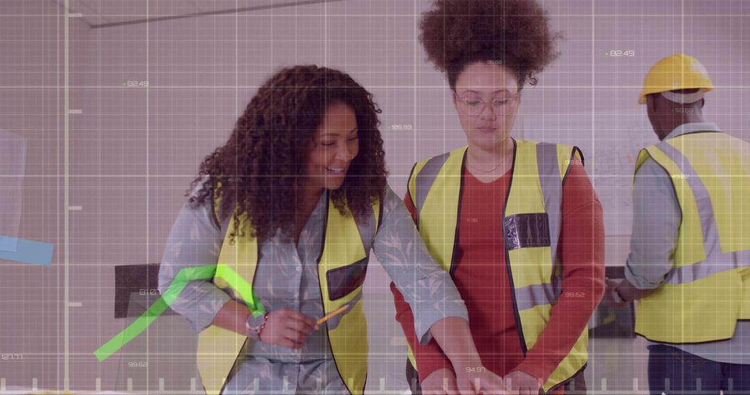 Diverse Engineers Analyzing Data with Advanced Technology Overlay