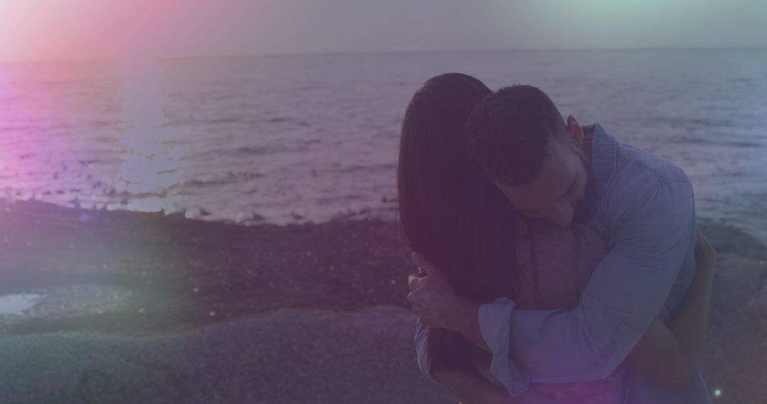 Romantic Beach Hug at Sunset with Soft Light Effects