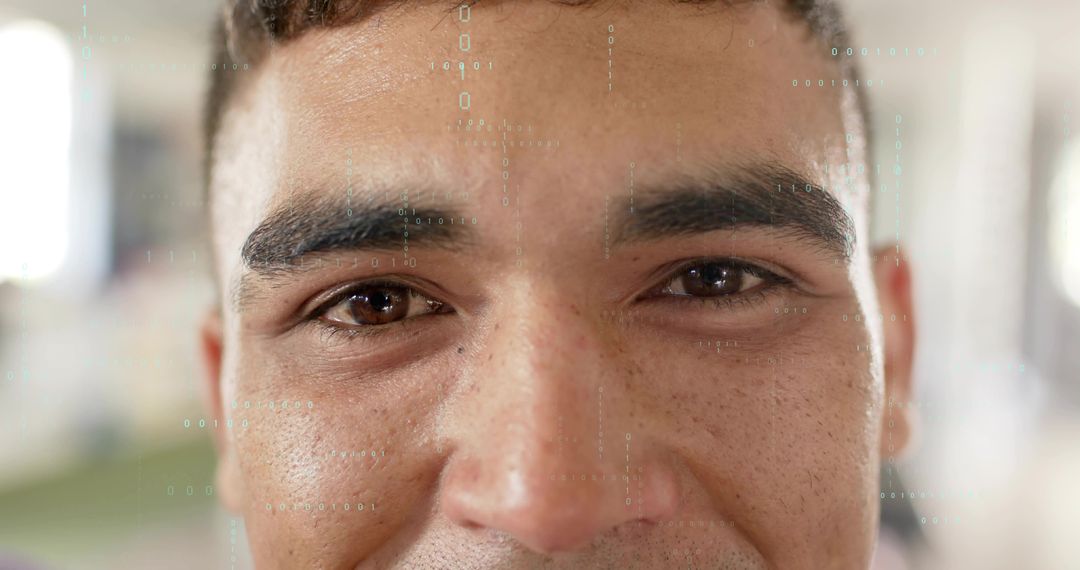 Closeup portrait showing man making direct eye contact with digital matrix code overlay
