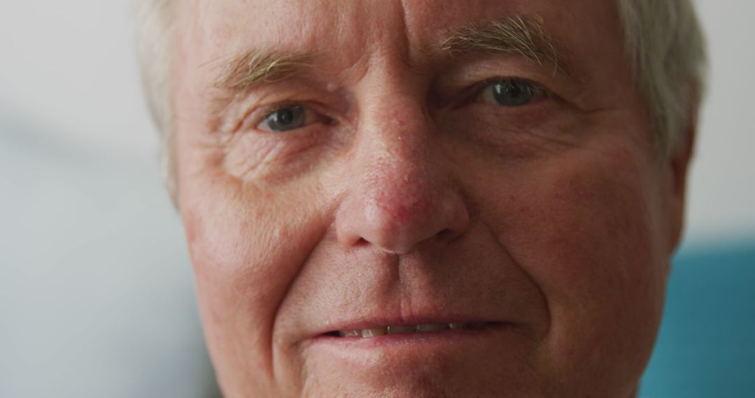 Close Up Portrait of Senior Man Smiling During Pandemic