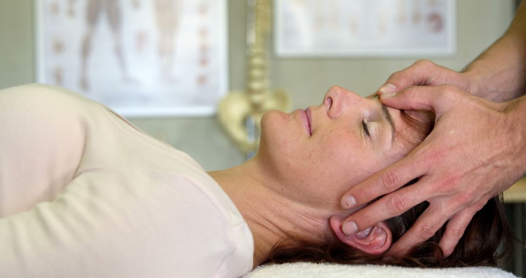 Woman Relaxing During Osteopathic Therapy Session - Free Images, Stock Photos and Pictures on Pikwizard.com