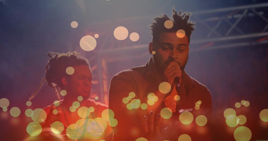 Energetic Music Performance with Vibrant Bokeh Lights