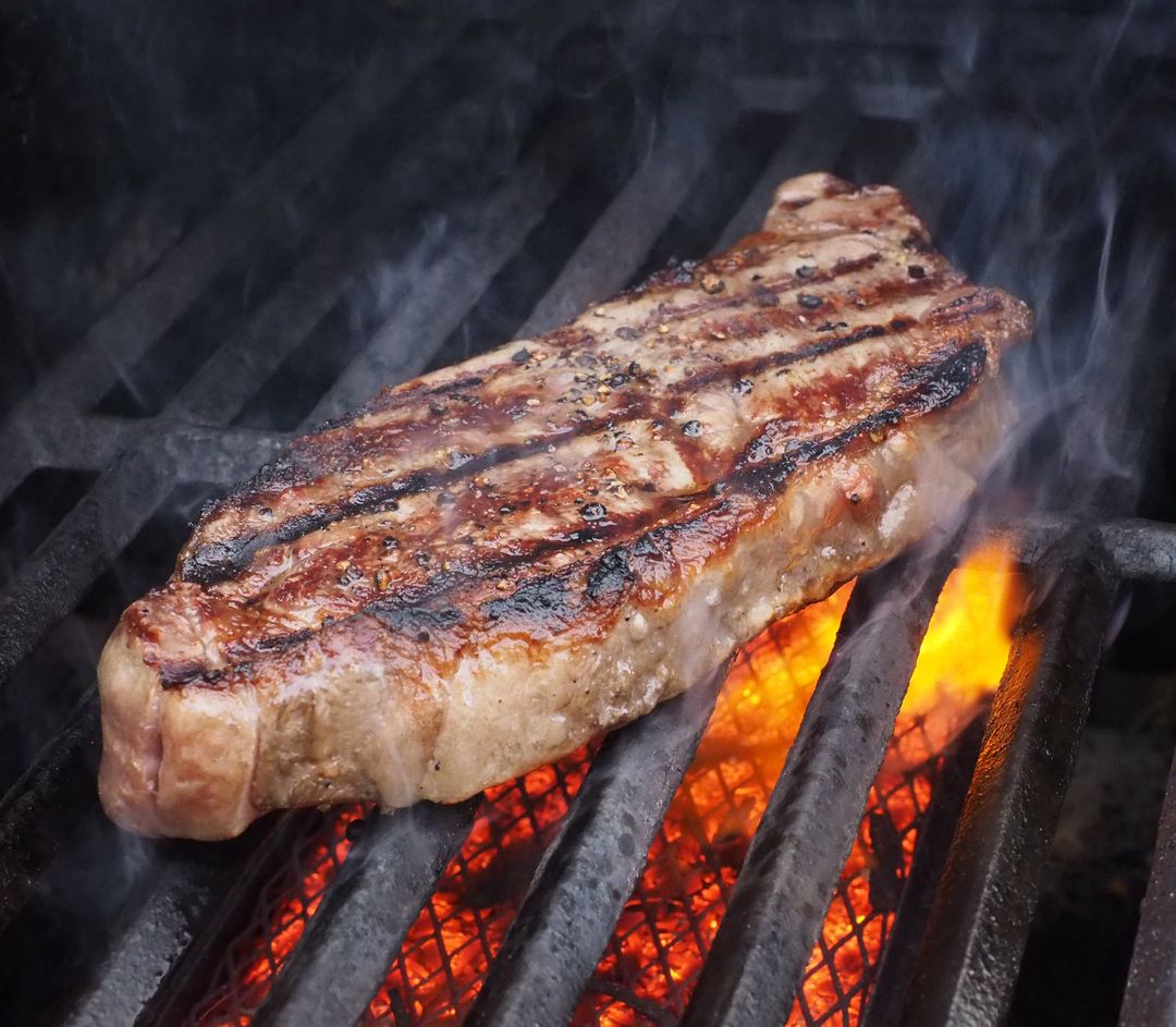 Grilled Steak Cooking on Flaming Barbecue Grill - Free Images, Stock Photos and Pictures on Pikwizard.com