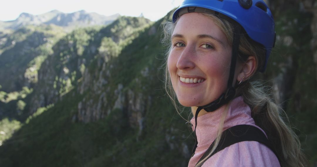Adventurous Young Woman Enjoying Mountain Zip Lining Experience