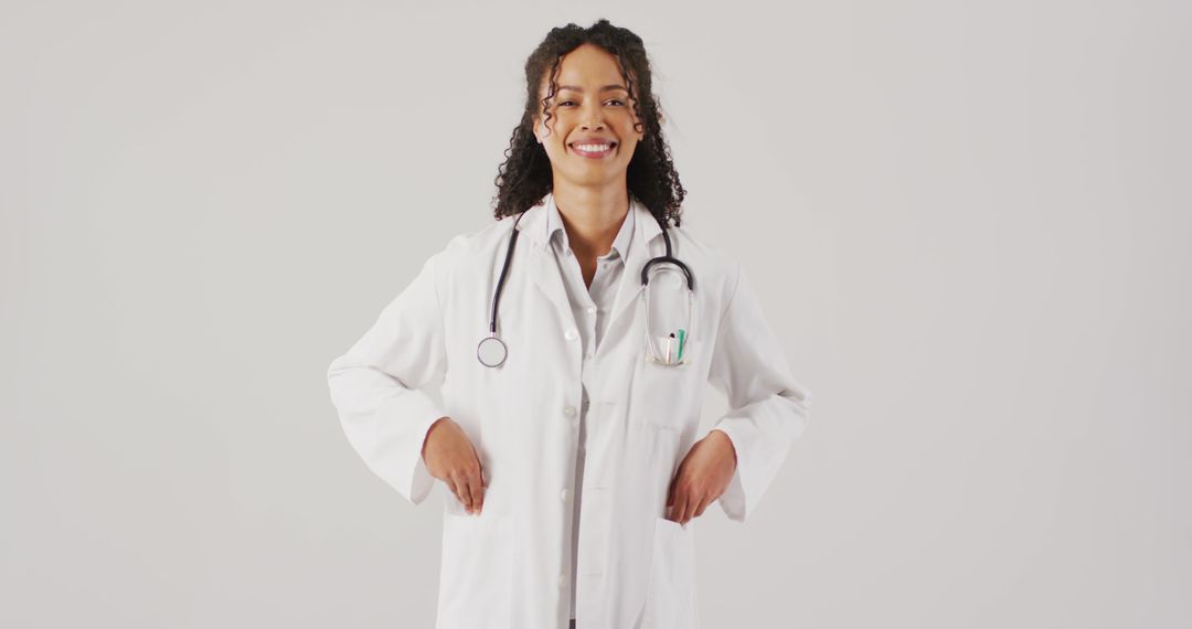 Confident Female Doctor Standing with Stethoscope - Free Images, Stock Photos and Pictures on Pikwizard.com