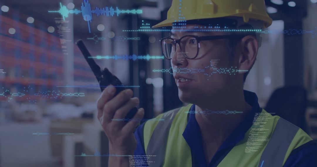 Industrial Worker Using Walkie-Talkie with Technology Overlays in Warehouse