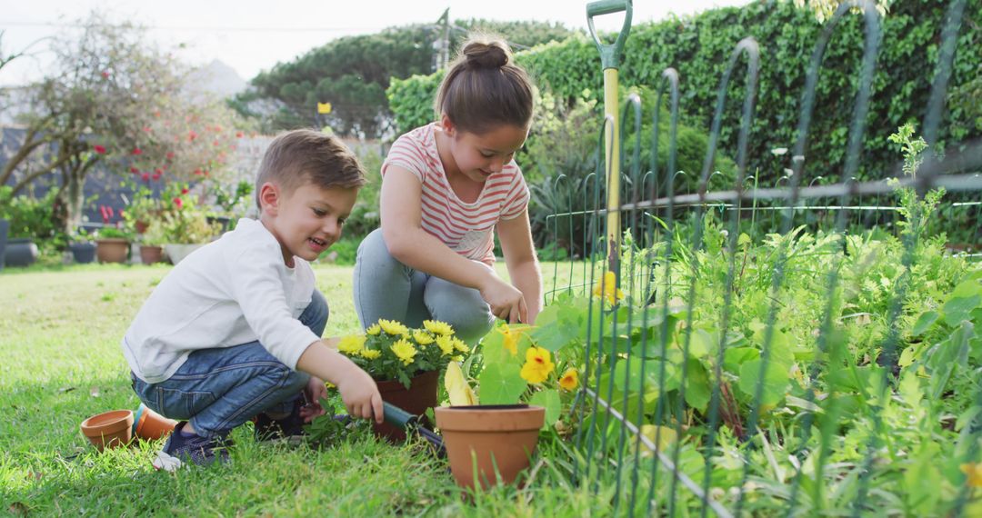 Children Gardening Together in Vibrant Vegetable Garden - Free Images, Stock Photos and Pictures on Pikwizard.com