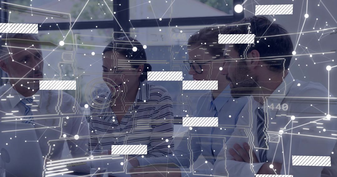 Team Analyzing Digital Network Diagrams in Modern Office