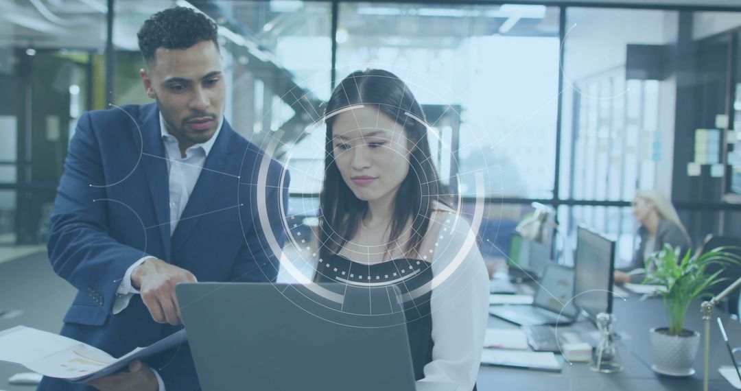 Diverse Colleagues Discussing Business Strategy with Futuristic Data Visualization