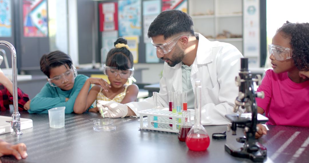 Enthusiastic Teacher Leading Science Experiment for Curious Students