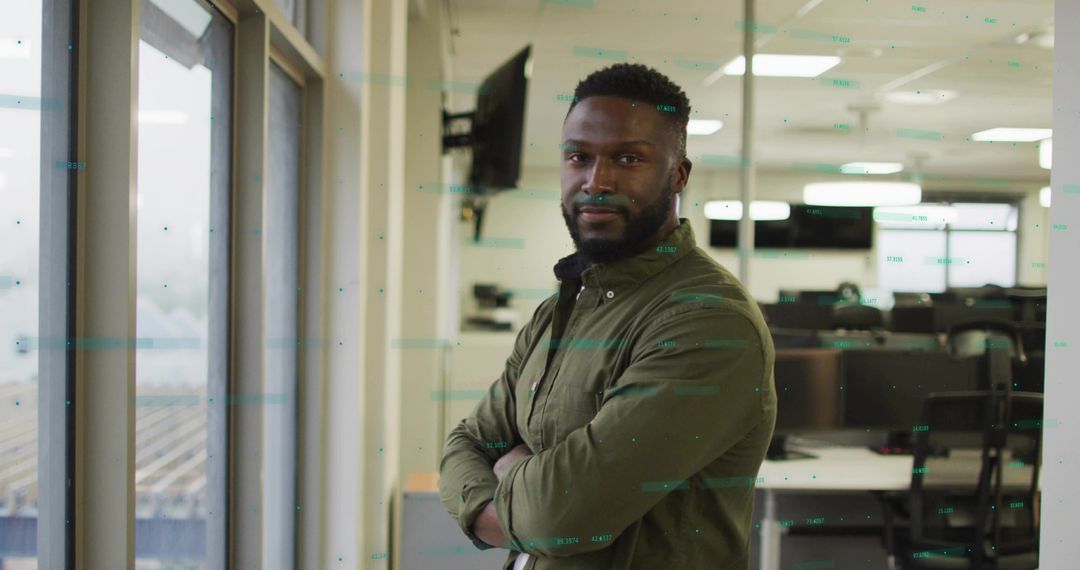 Confident Professional in Open-Plan Modern Office Setting