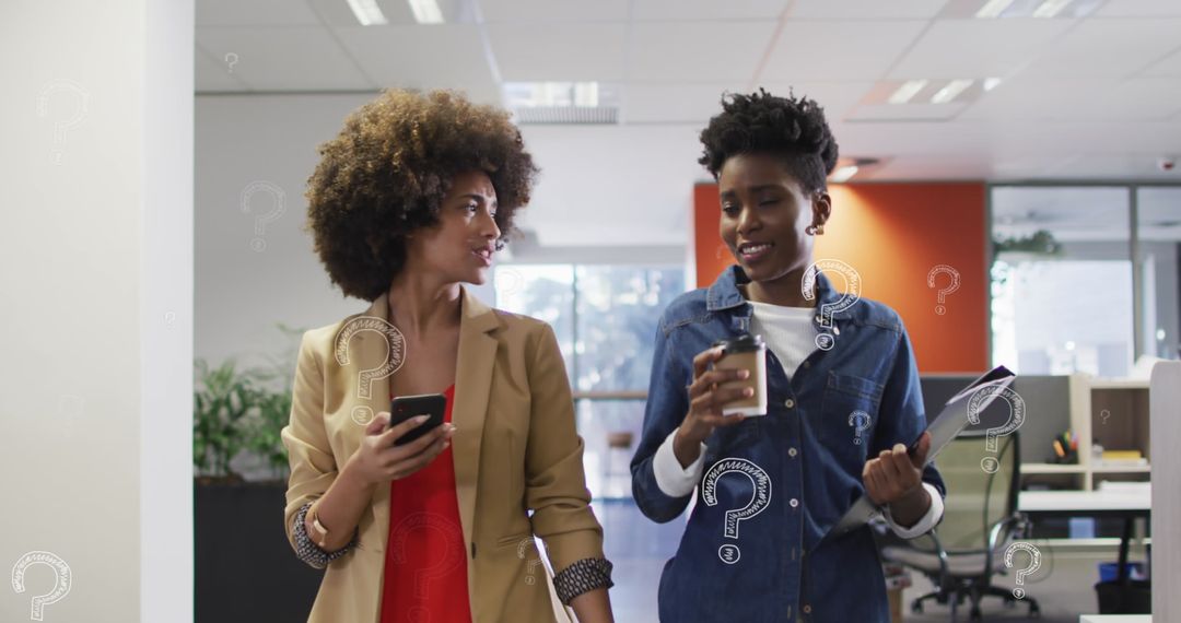 Colleagues Discussing Ideas in Modern Office