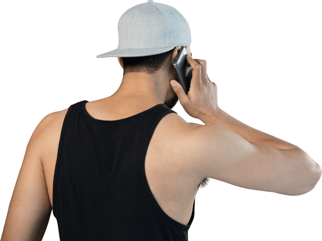 Man in Cap Talking on Phone in Young Lifestyle Setting
