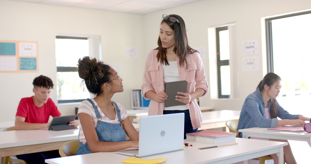 Diverse Classroom with Teacher and Students Using Technology