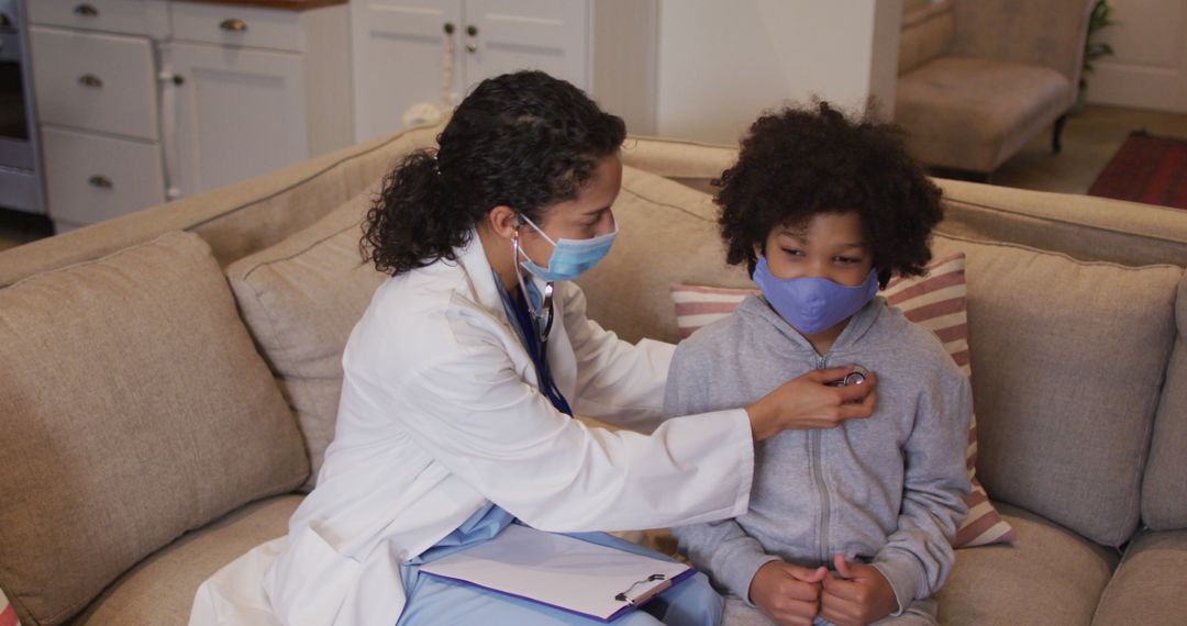 Doctor Checking Young Patient at Home During Pandemic - Free Images, Stock Photos and Pictures on Pikwizard.com