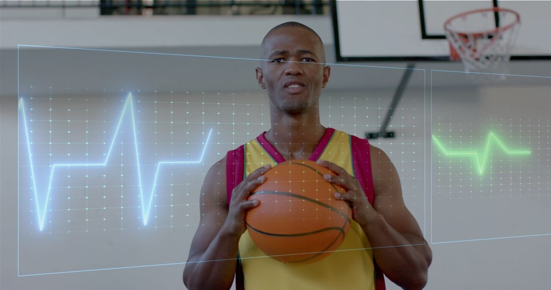 Basketball Player Analyzing Heart Rate Data on Court - Free Images, Stock Photos and Pictures on Pikwizard.com