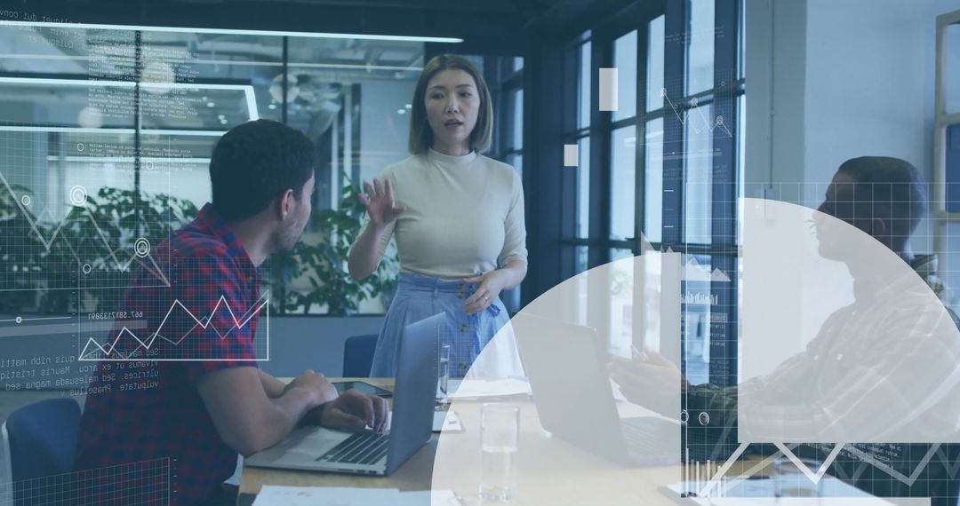 Business Team Collaborating with Data Analytics Graphics Overlay