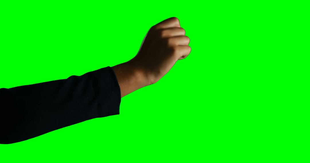 Outstretched Arm and Fist Gesturing on Green Screen Background - Free Images, Stock Photos and Pictures on Pikwizard.com
