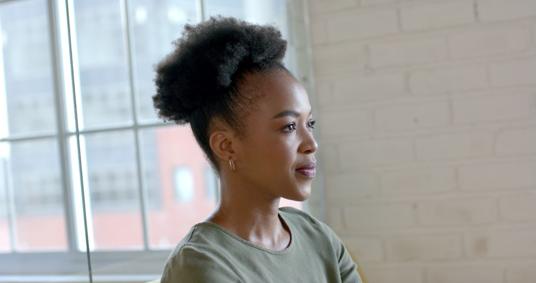 Thoughtful Businesswoman Deep in Contemplation in Modern Workspace