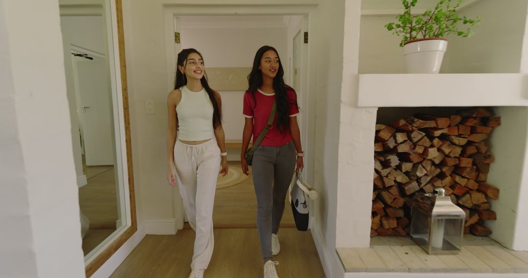 Two Friends Enjoying Casual Walk Indoors in Modern Home Setting
