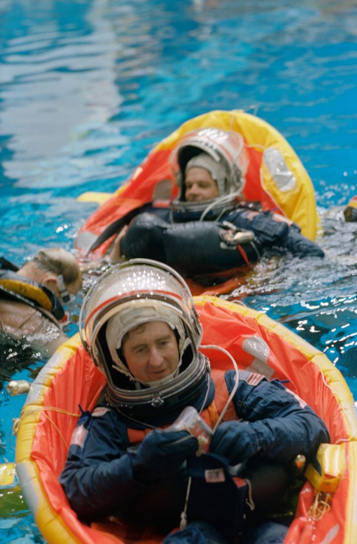 Astronauts Practicing Emergency Bailout in Pool