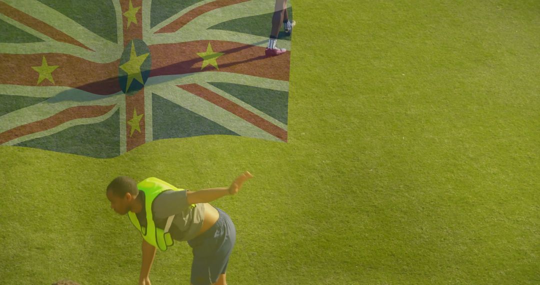 Soccer Player Stretching on Field with Flag Overlay