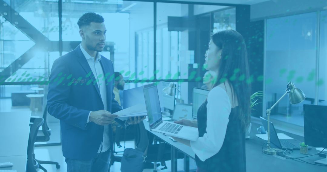 Diverse Business Team Analyzing Financial Data Using Technology