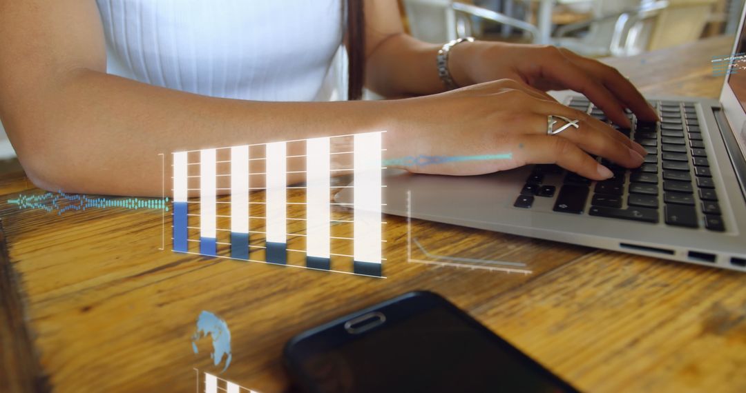 Businesswoman Analyzing Data on Laptop with Digital Interface