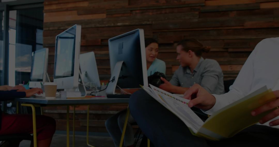 Professional Team Discussion in Modern Office Space