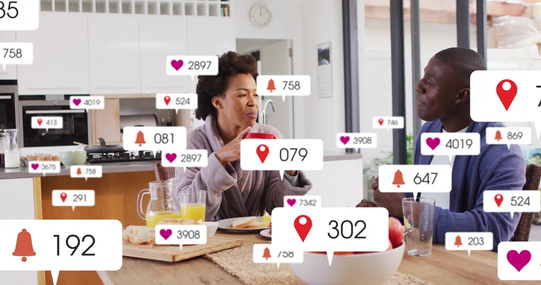 Couple Interacting with Social Media Notifications While Having Breakfast