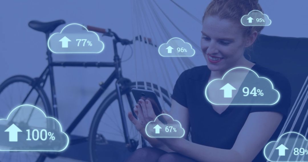 Woman Interacting with Cloud Graphics and Smart Technology