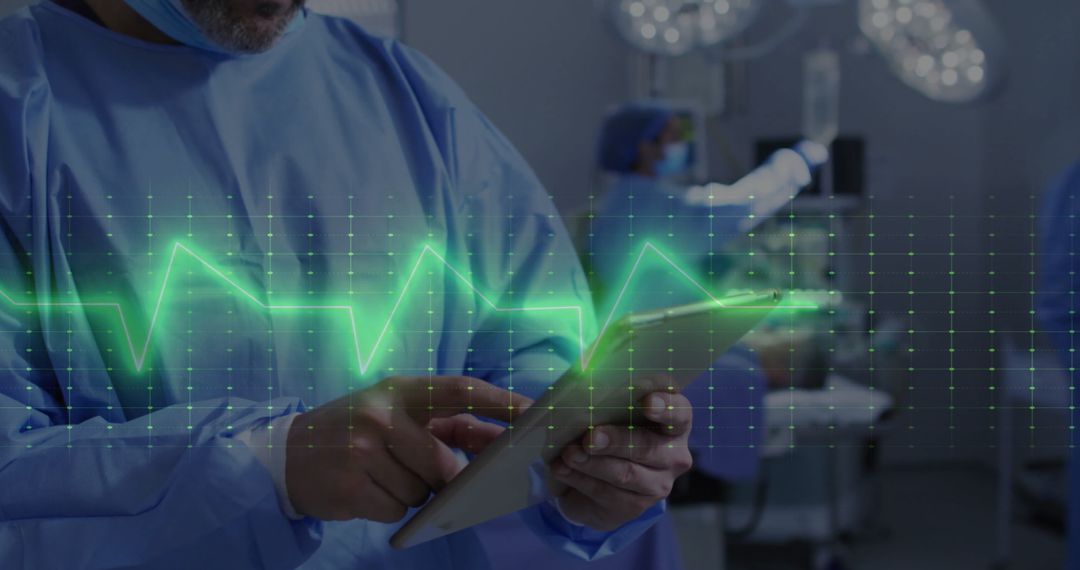 Surgeons Using Technology with Cardiograph Interface in Operating Room