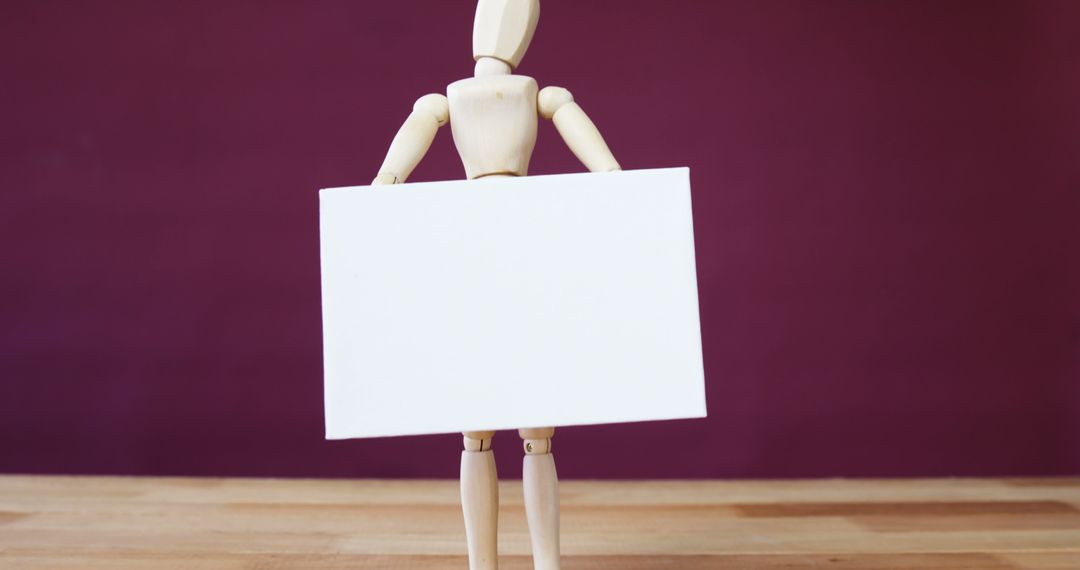 Wooden Dummy Holding Blank White Signboard Indoor - Free Images, Stock Photos and Pictures on Pikwizard.com