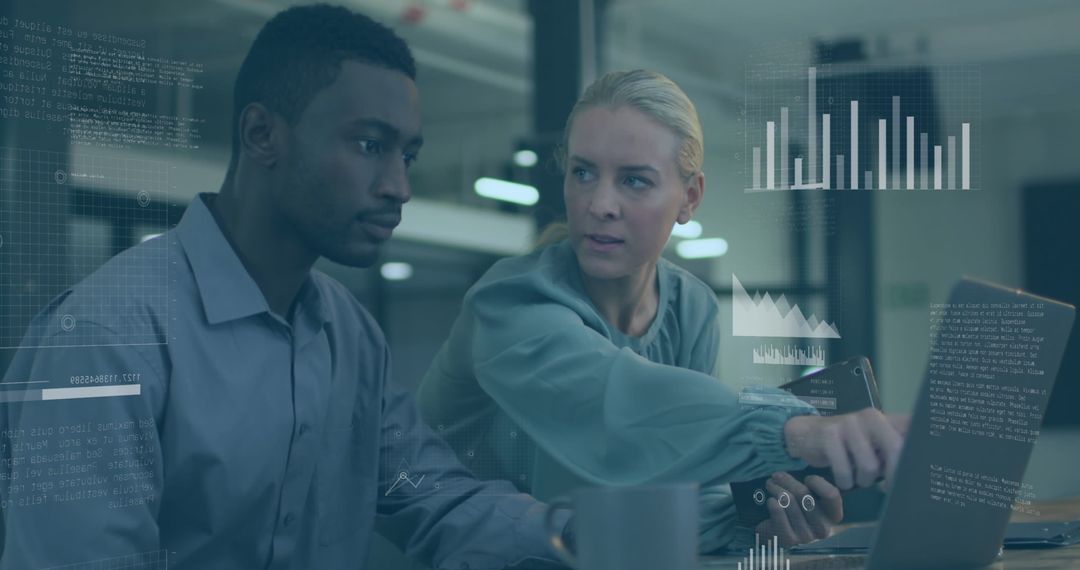 Team Analyzing Data on Laptop in Modern Office Environment