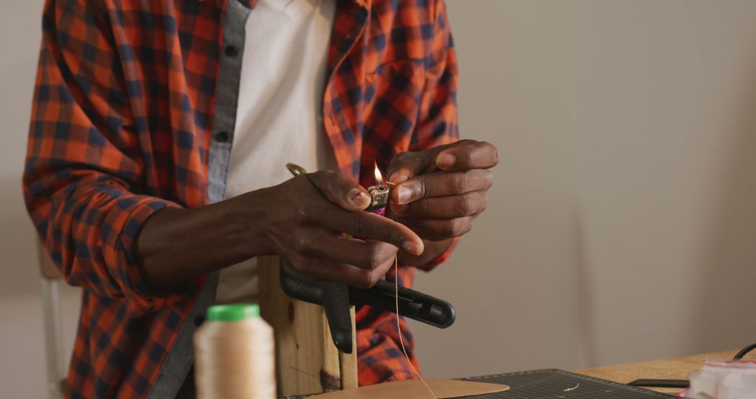 Artisan Skillfully Creating Leather Belt by Hand