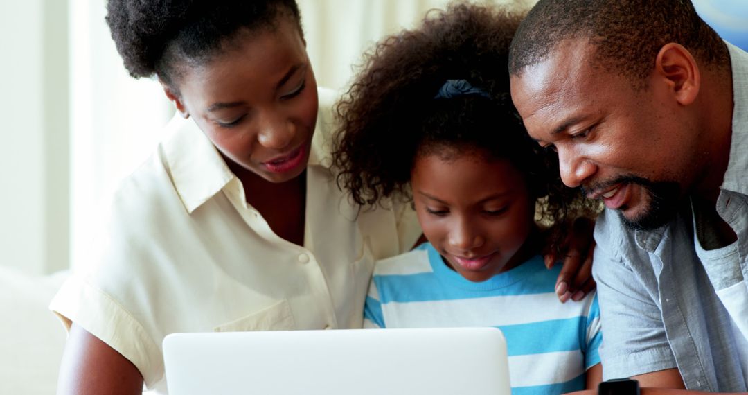 African American Family Bonding with Laptop in Living Room - Free Images, Stock Photos and Pictures on Pikwizard.com