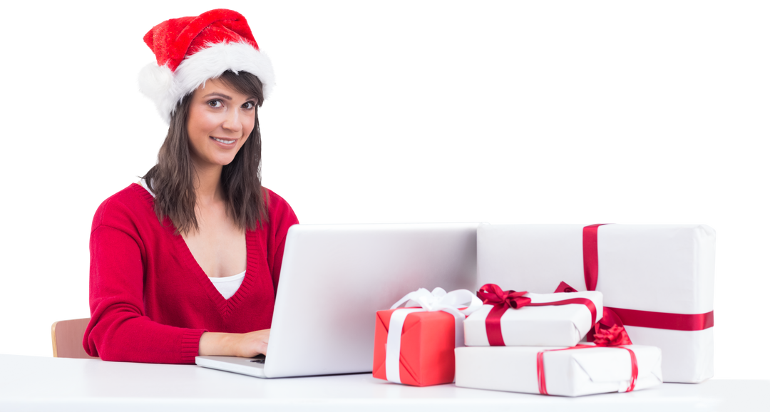 Festive Woman Wearing Santa Hat Shopping Online with Gifts on Table Transparent Background - Download Free Stock Images Pikwizard.com