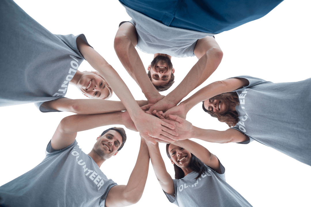 Transparent Team Unity with Volunteers Stacking Hands Outdoors