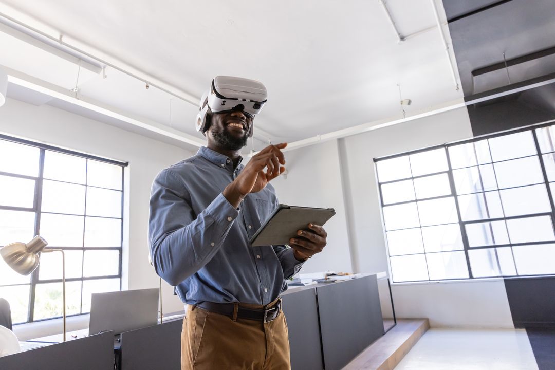 Man Experiencing VR Technology in Modern Workspace
