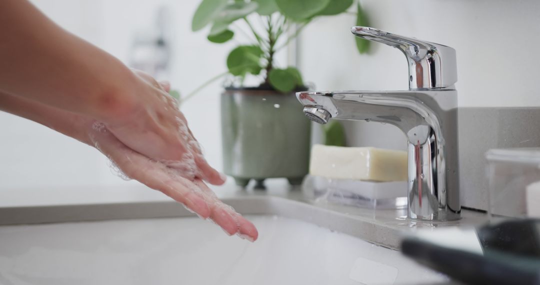 Person Washing Hands with Soap at Modern Sink - Free Images, Stock Photos and Pictures on Pikwizard.com