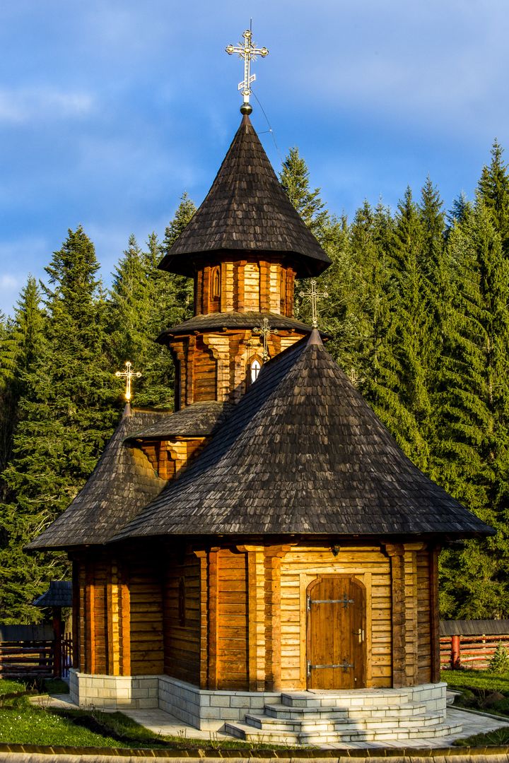 Rustic Wooden Church with Shingled Roof in Forested Area - Free Images, Stock Photos and Pictures on Pikwizard.com