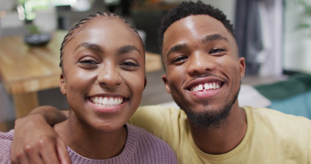 Happy Young African American Couple Smiling Together Indoors - Free Images, Stock Photos and Pictures on Pikwizard.com