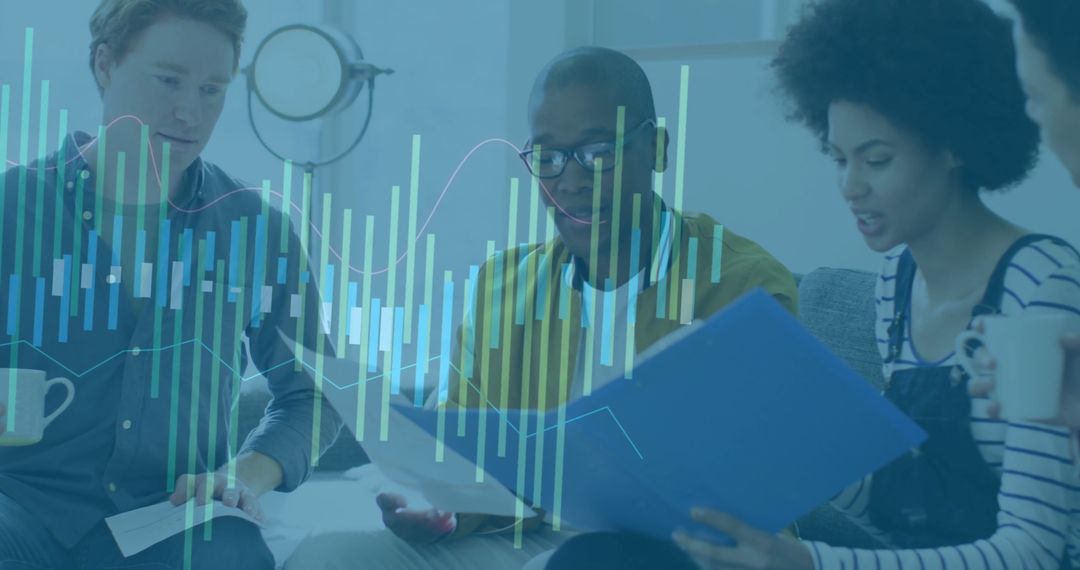 Diverse Colleagues Analyzing Financial Data Together in Office