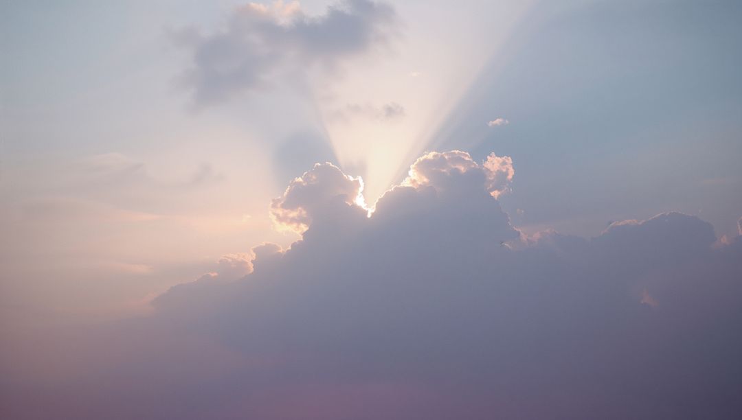 Sun Rays Breaking Through Clouds with Silver Lining