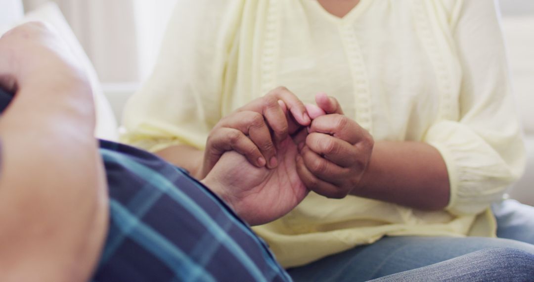 Close-Up of Holding Hands Showing Emotional Support and Care - Free Images, Stock Photos and Pictures on Pikwizard.com