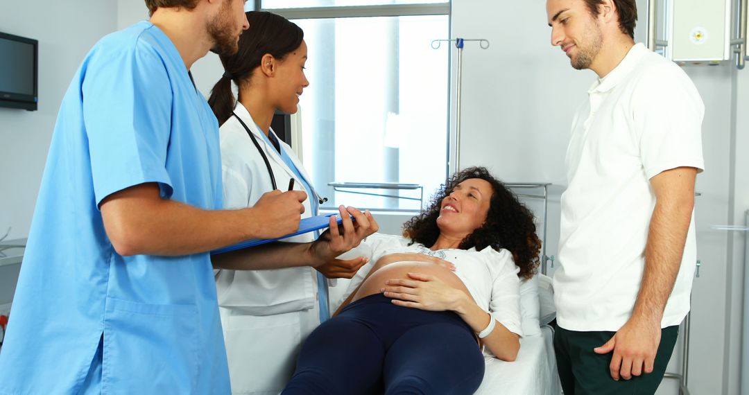 Pregnant Woman Receiving Medical Consultation at Hospital - Free Images, Stock Photos and Pictures on Pikwizard.com